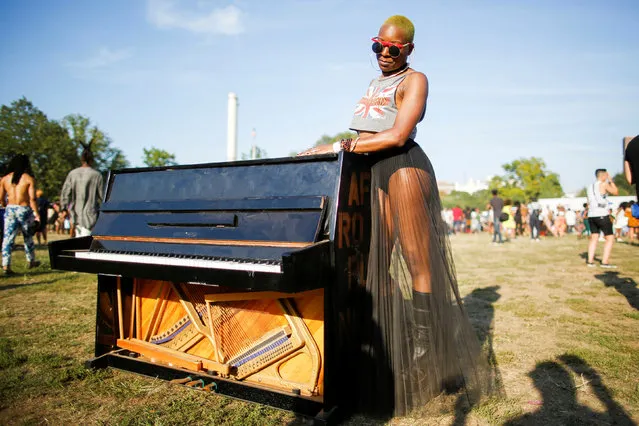 A woman takes part in the Annual Afropunk Music festival in the borough of Brooklyn in New York, U.S., August 27, 2016. (Photo by Eduardo Munoz/Reuters)