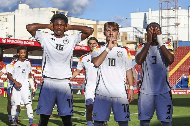 Lennart Karl of Germany U17 celebrates after scoring the team's second goal with Jeremiah Mensah and Osman Turay of Germany U17 during the UEFA Under17 EURO Qualifier between Germany U17 and Norway U17 at Estadio Francisco de la Hera on March 25, 2025 in Badajoz, Spain. (Photo by Carlos Rodrigues/Getty Images for DFB)