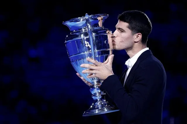 Carlos Alcaraz of Spain Carlos Alcaraz of Spain receives the trophy as best ATP player of 2022 during day four of the Nitto ATP Finals at Pala Alpitour on November 16, 2022 in Turin, Italy. (Photo by Guglielmo Mangiapane/Reuters)