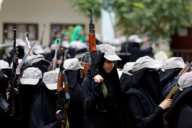 Women loyal to the Houthi movement carry rifles as they take part in a parade to show support to the movement in Sanaa, Yemen September 7, 2016. (Photo by Khaled Abdullah/Reuters)