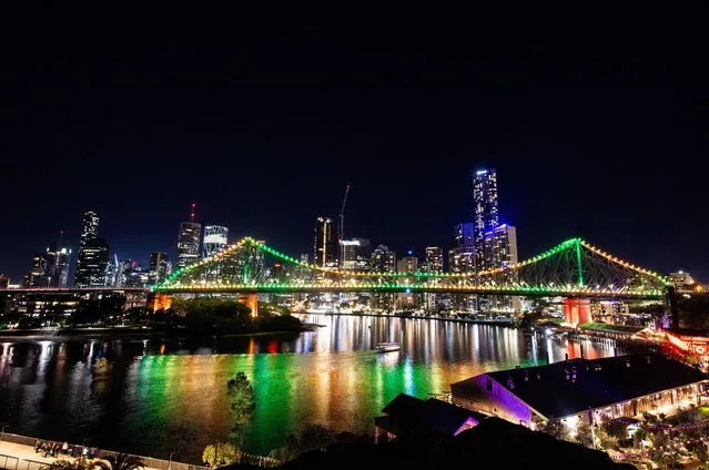 The Story Bridge is seen lit up in green and yellow lights during FIFA Women's World Cup 2023 'Unity Lights' event on July 16, 2022 in Brisbane, Australia. (Photo by Bradley Kanaris/Getty Images for FIFA)