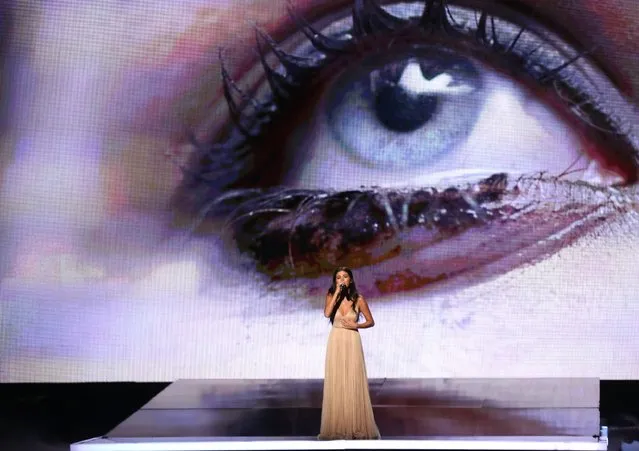 Selena Gomez performs at the 42nd annual American Music Awards at Nokia Theatre L.A. Live on Sunday, November 23, 2014, in Los Angeles. (Photo by Matt Sayles/Invision/AP Photo)