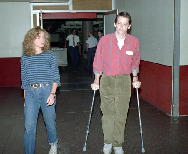 Actor Matthew Broderick and his girlfriend Jennifer Grey arrive at New York's Kennedy Airport on September 9, 1987 after Broderick was charged in Ireland and released on bail in connection with an automobile accident that killed two people.  Broderick's car collided with a vehicle carrying two women, but he says he has no recollection of the accident. (Photo by David Bookstaver/AP Photo)