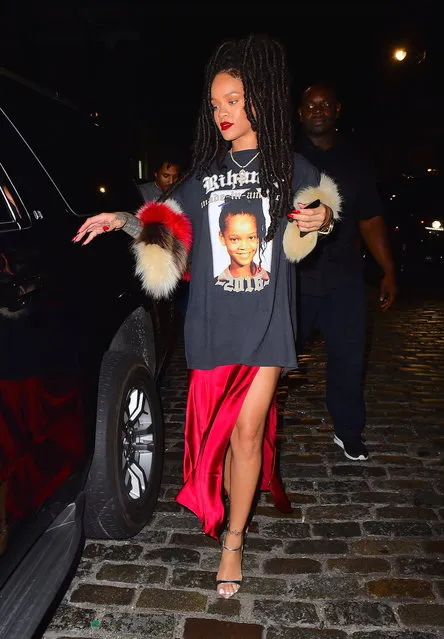 Rihanna was spotted heading to 1 Oak Nightclub in NYC in the early hours of Thursday morning, October 6, 2016. After dining at Carbone, Rihanna headed back to change into a comfier outfit for the club. She put on the Ultimate Throwback Thursday, a T-shirt with her Grade School Portrait on the front. The singer looks almost identical to the photo , even 20 years later . She carried a multi colored fur , and wore a red dress under the t-shirt as she made her way to the club with a few pals. (Photo by 247PAPS.TV/Splash News)