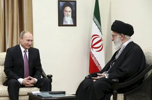 Iran's Supreme Leader Ayatollah Ali Khamenei (R) meets Russia's President Vladimir Putin in Tehran November 23, 2015. (Photo by Reuters/leader.ir)