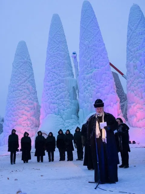 Finnish Orthodox Archbishop Leo attends the opening ceremony for the ice structure of Sagrada Familia in Juuka, January 24, 2015. The ice structure, which is made from a mixture of wood fibres and ice, is based on the design of the Sagrada Familia in Barcelona and built by students from the Eindhoven University of Technology. (Photo by Timo Hartikainen/Reuters/Lehtikuva)