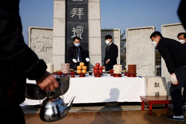 Relatives of North Korean refugees set up an altar for a memorial service for their North Korean ancestors, near the demilitarised zone separating the two Koreas, in Paju, February 12, 2021, on the occasion of Seolnal, the Korean Lunar New Year. (Photo by Kim Hong-Ji/Reuters)
