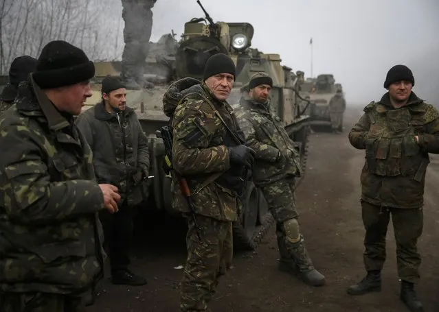 Members of the Ukrainian armed forces are seen not far from Debaltseve, eastern Ukraine February 15, 2015. (Photo by Gleb Garanich/Reuters)