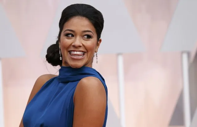 Actress Gina Rodriguez, wearing a bright blue Manon Gabard gown, arrives at the 87th Academy Awards in Hollywood, California February 22, 2015. Rodriguez recently won a Golden Globe for her role in “Jane the Virgin”. (Photo by Mario Anzuoni/Reuters)