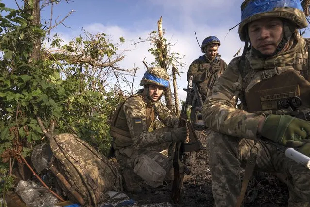 Ukrainian servicemen from the 3rd Assault Brigade at frontline positions near Andriivka, Donetsk region, Ukraine, Saturday, September 16, 2023. Ukrainian brigade's two-month battle to fight its way through a charred forest shows the challenges of the country's counteroffensive in the east and south. (Photo by Mstyslav Chernov/AP Photo)