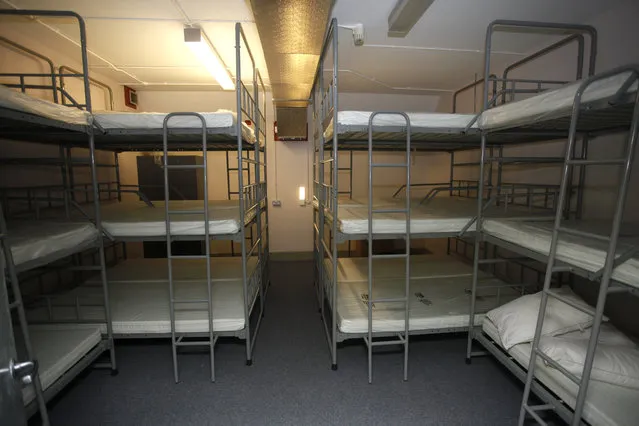 Some of the sleeping quarters inside the nuclear bunker that was built  during the cold war in Ballymena, Northern Ireland, Thursday, February 4, 2016. Northern Ireland is selling its Cold War-era nuclear bunker, an underground installation with room for 235 beds that sellers imagine could be transformed into a tourist attraction or blast-proof storage facility. Journalists took a tour Thursday of Northern Ireland's strangest real estate offering. (Photo by Peter Morrison/AP Photo)