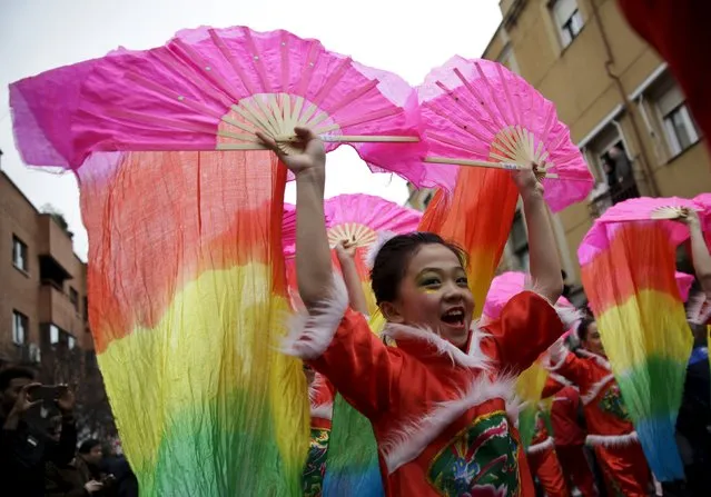 Girls perform during a parade to celebrate the Chinese Lunar New Year, which welcomes the Year of the Monkey, in Madrid, Spain, February 13, 2016. (Photo by Andrea Comas/Reuters)
