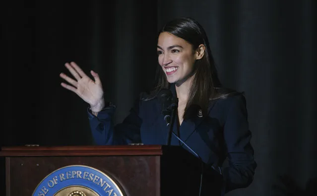 Rep. Alexandria Ocasio-Cortez, D-N.Y., delivers her inaugural address following her swearing-in ceremony at the Renaissance School for Musical Theater and Technology in the Bronx borough of New York on Saturday, February 16, 2019. (Photo by Kevin Hagen/AP Photo)