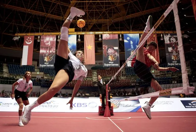 Sepak Takraw – ISTAF Super Series Korea 2014-15 – Gunsan City, South Korea April 26, 2015: Thailand's Fueangfa (L) in action during the final. (Photo by Jeremy Lee/Reuters)