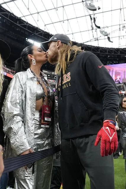 San Francisco 49ers tight end George Kittle, right, kisses his wife Claire Kittle before the NFL Super Bowl 58 football game against the Kansas City Chiefs, Sunday, February 11, 2024, in Las Vegas. (Photo by Ashley Landis/AP Photo)