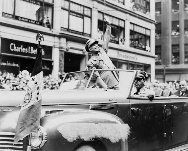 U.S. General Dwight D. Eisenhower waves to the crowd at a parade in the United States in 1945, in this handout photo provided by the United States Library of Congress. Seventy years ago, following the suicide of Nazi leader Adolf Hitler, Germany's head of state Karl Donitz signed his country's surrender to Allied forces in Reims, France on May 7, 1945 and in Berlin on May 8, 1945. (Photo by Fred Palumbo/Reuters/United States Library of Congress)