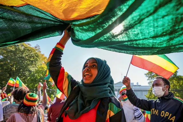 Demonstrators hold a protest to denounce the United States stance on the conflict in Ethiopia, outside the White House in Washington, U.S., November 8, 2021. (Photo by Evelyn Hockstein/Reuters)