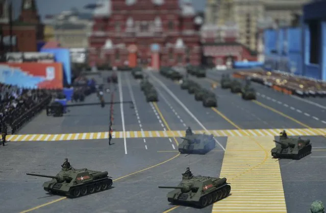 Soviet SU-100 tank destroyers drive during the Victory Day parade at Red Square in Moscow, Russia, May 9, 2015. (Photo by Reuters/Host Photo Agency/RIA Novosti)