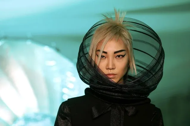 A model presents a creation by French designer Jean Paul Gaultier as part of his Fall/Winter 2014-2015 women's ready-to-wear collection show during Paris Fashion Week, on March 1, 2014. (Photo by Benoit Tessier /Reuters)