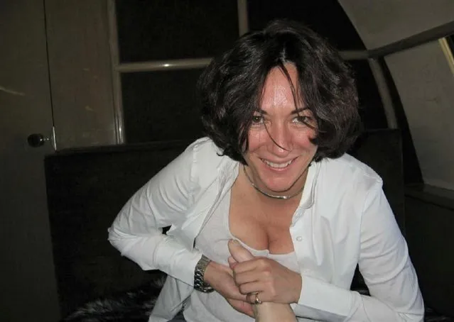Picture of British socialite, known for her association with financier and convicted sеx offender Jeffrey Epstein Ghislaine Maxwell rubbing Jeffrey Epstein's feet (undated photo). Maxwell and Epstein were in a relationship but prosecutors allege they remained close after it ended. The photo was entered into evidence during the trial of Ghislaine Maxwell, accused of sеx trafficking, in New York City. (Photo by PA Wire Press Association)