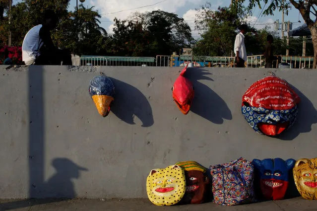 Carnival decorations made of papier mache set for sale in a street of Port-au-Prince, Haiti, February 25, 2017. (Photo by Andres Martinez Casares/Reuters)