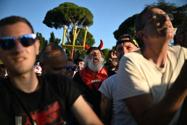 Didi Senft, a cycling enthusiast better known as “El Diablo” (The Devil) reacts in the crowd of spectators during the team presentation for the 111th edition of the Tour de France cycling race, in Florence in Italy, on June 27, 2024. (Photo by Marco Bertorello/AFP Photo)