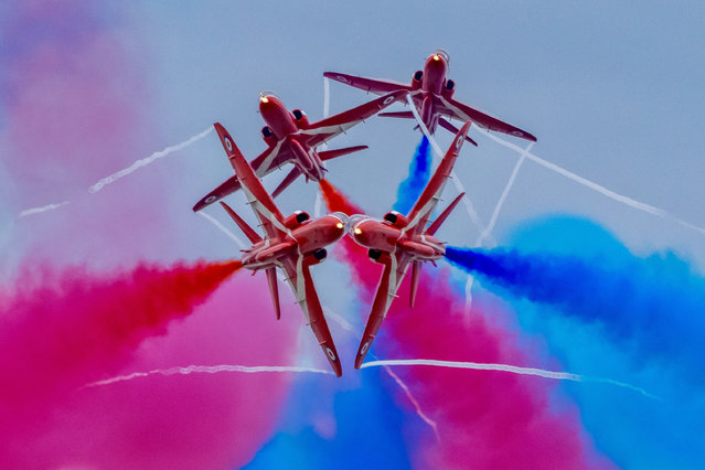 Picture dated July 13th, 2024 shows the Red Arrows at the Southport Airshow in Merseysidey in North West England. Hundreds attended the annual airshow over the weekend, which saw a series of iconic planes fly over the beach. (Photo by Martyn Foss/Bav Media)