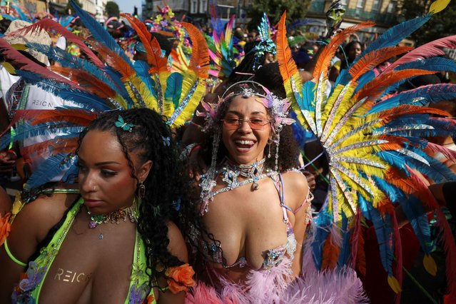 Revellers participate in the Notting Hill Carnival parade, in London, Britain on August 26, 2024. (Photo by Hollie Adams/Reuters)