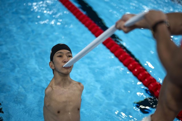 Eigo Tanaka, from Japan, practices the start of the race during a warm up session ahead of a competition, during the 2024 Paralympics, Tuesday, September 3, 2024, in Paris, France. (Photo by Emilio Morenatti/AP Photo)