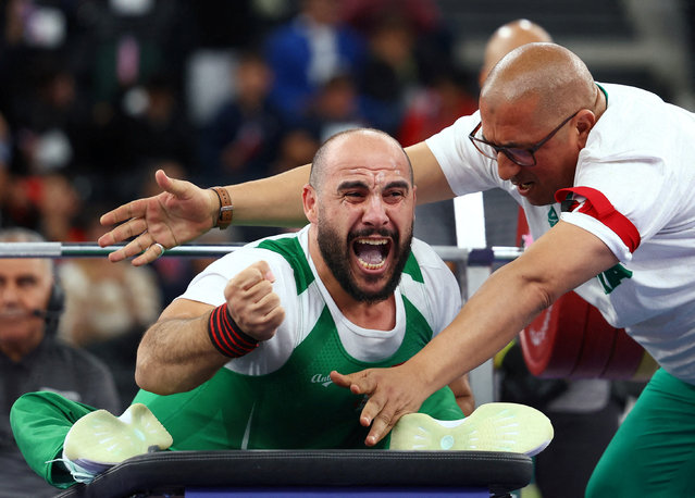 Algeria's Hocine Bettir reacts after winning the bronze medal in the men's Powerlifting up to 65kg final during the Paris 2024 Paralympic Games, at La Chapelle Arena in Paris, on September 5, 2024. (Photo by Rula Rouhana/Reuters)