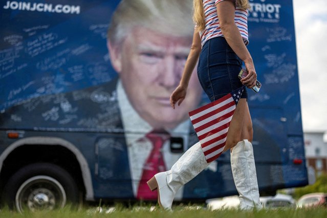 A supporter of Republican presidential nominee and former U.S. President Donald Trump arrives at a campaign rally in Indiana, Pennsylvania on September 23, 2024. (Photo by Carlos Barria/Reuters)