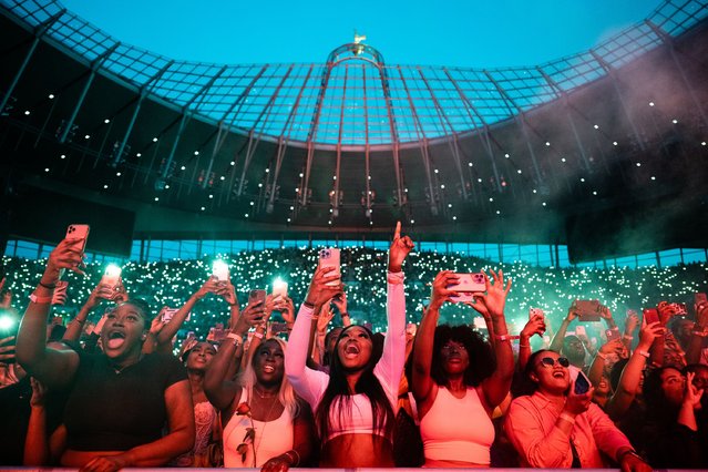 Fans as Nigerian singer Wizkid performs at Tottenham Hotspur Stadium on July 29, 2023 in London, England. (Photo by Samir Hussein/WireImage)