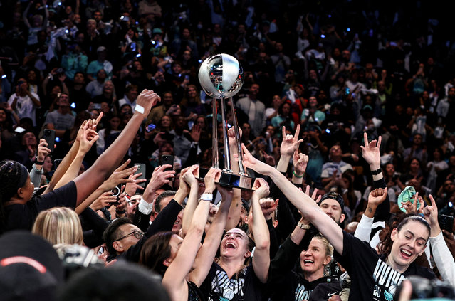 The New York Liberty celebrate after winning the 2024 WNBA Finals at Barclays Center in Brooklyn, New York on October 21, 2024. (Photo by Wendell Cruz/Imagn Images via Reuters)