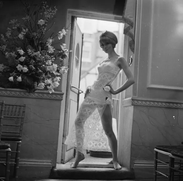 1966: Nicky Allen models a white bikini under a lacy terrace dress from the new Christian Dior collection
