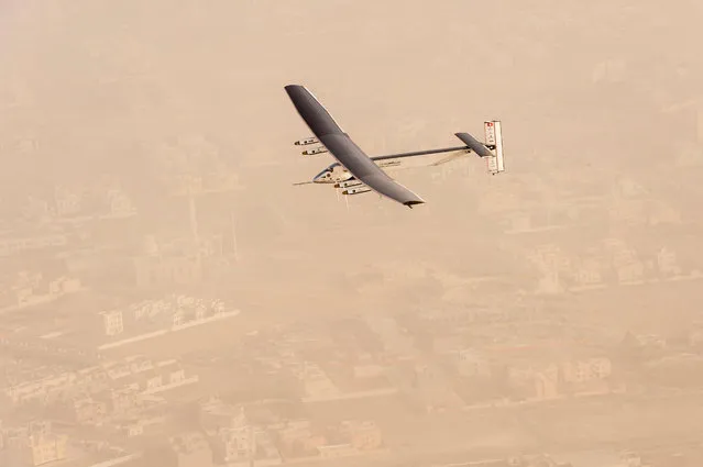 A view of the Solar Impulse 2 on flight after taking off from Al Bateen Airport in United Arab Emirates, in this handout picture provided to Reuters, courtesy of Jean Revillard, on March 9, 2015. (Photo by Jean Revillard/Reuters/Solar Impulse)