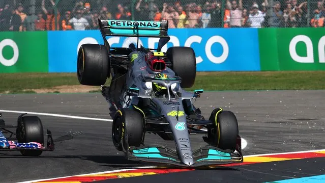 Lewis Hamilton of Great Britain driving the (44) Mercedes AMG Petronas F1 Team W13 lands on the run off area after a crash during the F1 Grand Prix of Belgium at Circuit de Spa-Francorchamps on August 28, 2022 in Spa, Belgium. (Photo by Joe Portlock – Formula 1/Formula 1 via Getty Images)