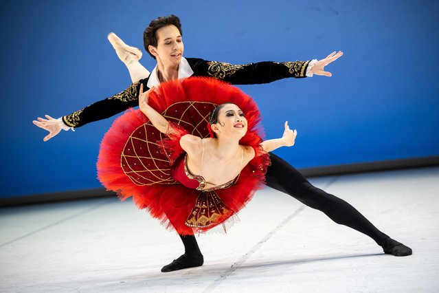 Kazakh Bogdan Verbovoy and his Japanese partner Hashimoto Arisa perform during the Budapest Ballet Grand Prix in the National Dance Theatre in Budapest, Hungary, on November 21, 2024. Budapest Ballet Grand Prix aims to become the most renowned and respected ballet competition in Central Europe. The competition offers young dancers an opportunity to compete and gain exposure in the international dance scene. (Photo by Marton Monus/Reuters)