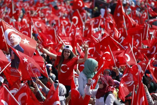 People wave Turkey's national flags during the Democracy and Martyrs Rally, organized by Turkish President Tayyip Erdogan and supported by ruling AK Party (AKP), oppositions Republican People's Party (CHP) and Nationalist Movement Party (MHP), to protest against last month's failed military coup attempt, in Istanbul, Turkey, August 7, 2016. (Photo by Osman Orsal/Reuters)