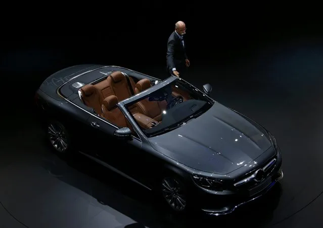 Daimler CEO Dieter Zetsche presents the Mercedes-Benz S 500 cabrio car during the media day at the Frankfurt Motor Show (IAA) in Frankfurt, Germany, September 15, 2015. (Photo by Ralph Orlowski/Reuters)