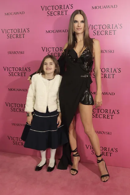Victoria's Secret's model Alessandra Ambrosio poses with her daughter Anja, at the after party of the Victoria's Secret fashion show inside the Mercedes-Benz Arena in Shanghai, China, Monday, November 20, 2017. (Photo by AP Photo/Stringer)