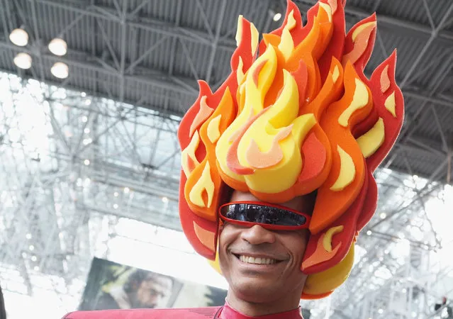 A fan poses for a picture during 2014 New York Comic Con – Day 1  at Jacob Javitz Center on October 9, 2014 in New York City. (Photo by Mike Coppola/Getty Images)