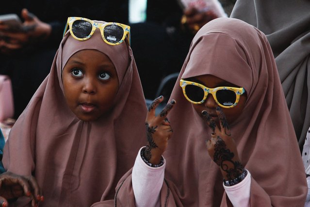 Muslim children react as they attend Eid al-Fitr prayers, at the Sir Ali Muslim Club Ground in Ngara district of Nairobi, Kenya, on March 30, 2025. (Photo by Monicah Mwangi/Reuters)