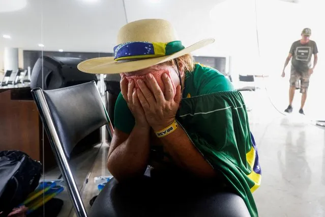 A supporter of Brazil's former President Jair Bolsonaro reacts during a demonstration against President Luiz Inacio Lula da Silva in Brasilia, Brazil on January 8, 2023. (Photo by Adriano Machado/Reuters)