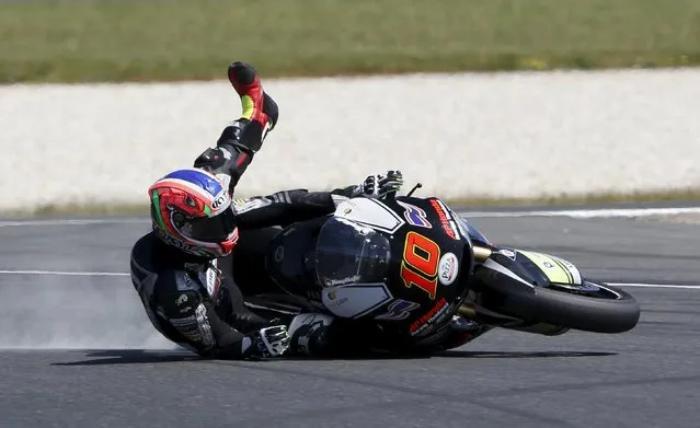 APH PTT The Pizza SAG Moto2 rider Thitipong Warokorn of Thailand crashes during free practice 3 before the Australian Grand Prix on Phillip Island, October 17, 2015. (Photo by Brandon Malone/Reuters)