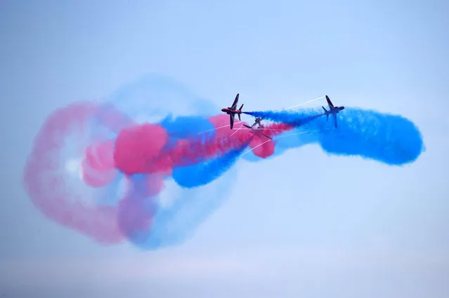 Red Arrows, officially known as the Royal Air Force Aerobatic Team, perform at the China International Aviation Exhibition Center ahead of the 11th China International Aviation and Aerospace Exhibition on October 27, 2016 in Zhuhai, Guangdong Province of China. The 11th China International Aviation and Aerospace Exhibition will be held on November 1-6 in Zhuhai. Formed in late 1964, the Royal Air Force Aerobatic Team has completed over 4,800 shows with superb piloting skills and it is the first time that Red Arrows perform in China. (Photo by VCG/VCG via Getty Images)