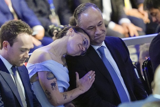 Second gentleman Doug Emhoff and daughter Ella attend the Democratic National Convention in Chicago, August 22, 2024. (Photo by Charles Rex Arbogast/AP Photo)
