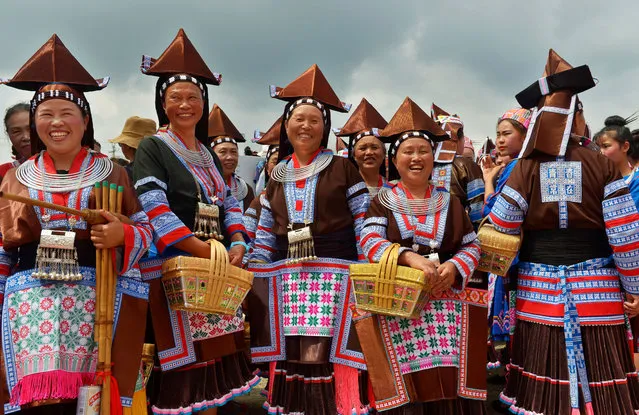 Miao people celebrate a folk festival which falls on the eighth day of the fourth month in Chinese lunar calendar on May 22, 2018 in Anshun, Guizhou Province of China. (Photo by VCG/VCG via Getty Images)