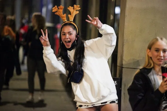 A girl poses in antlers ahead of a curfew on pub in Nottingham, a city in central England’s Midlands region on September 21, 2020 as Freshers' Week got underway. Revellers were also pictured out in Birmingham, which was plunged into a local lockdown amid a surge in coronavirus cases. (Photo by Ashley Kirk/The Sun)