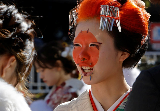 Kimono-clad young women stand at the venue for their Coming of Age Day celebration ceremony in Yokohama, south of Tokyo, Japan, on January 13, 2025. (Photo by Manami Yamada/Reuters)