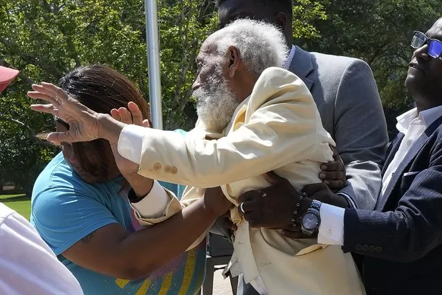 Political activist and writer James Meredith is assisted by program staff after falling outside the Mississippi Capitol at an event marking his 90th birthday, in Jackson, Miss., Sunday, June 25, 2023. (Photo by Rogelio V. Solis/AP Photo)